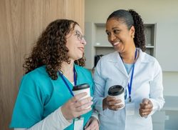 female medical staff talking and smiling